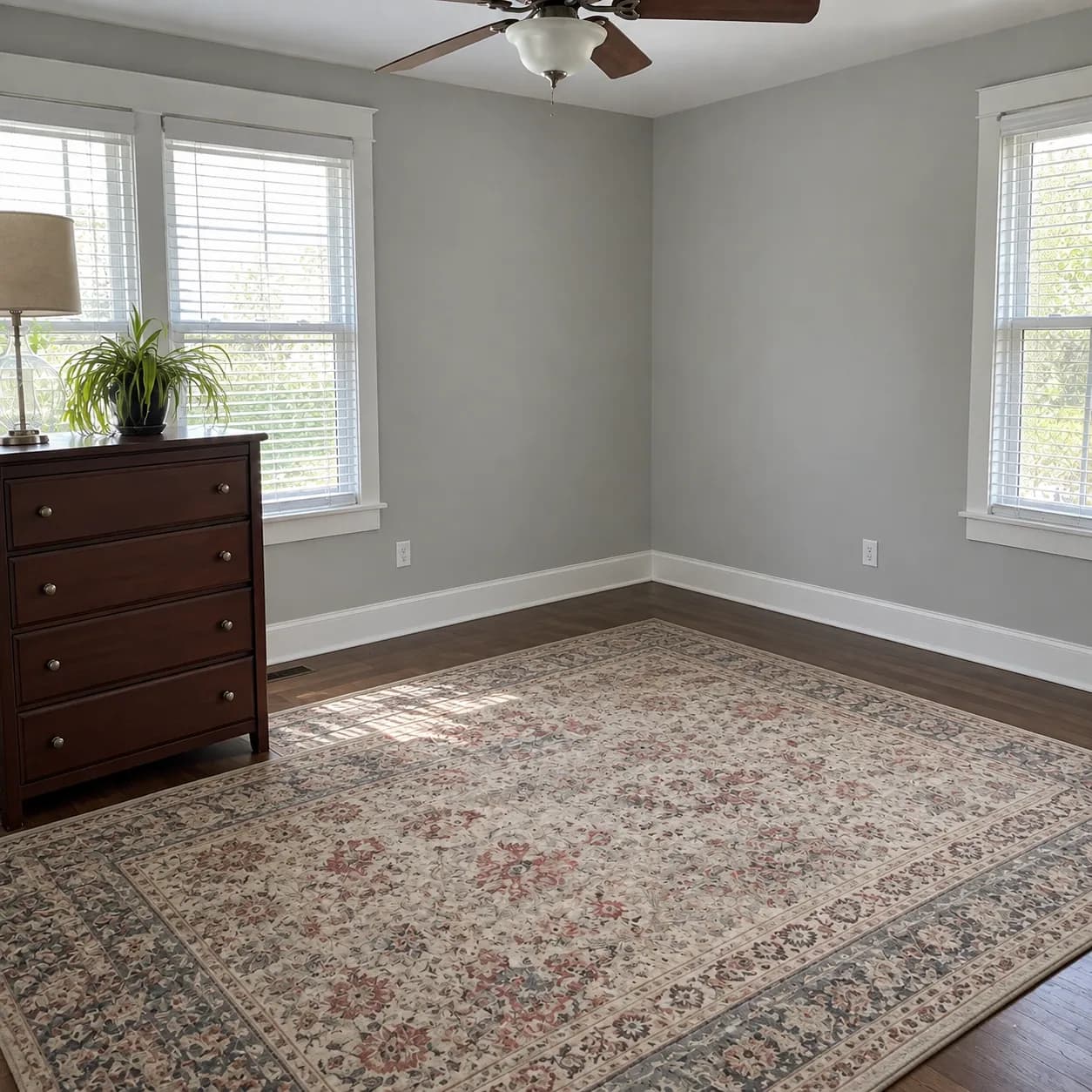 The same Plano bedroom cleared back to the rug and one dresser after the cleanout