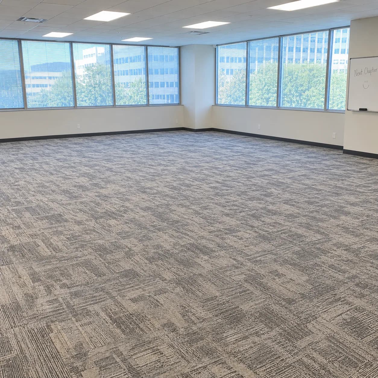 The same Plano office suite emptied to bare carpet and ready for the next tenant